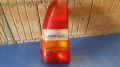 Rckleuchte links mit Lampentrger<br>FORD ESCORT VI KOMBI (GAL) 1.6I 16V