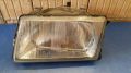 Hauptscheinwerfer links H4<br>AUDI 100 (44, 44Q, C3) 1.8 CAT