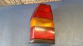 Rckleuchte links mit Lampentrger<br>VW POLO (86C, 80) 1.3